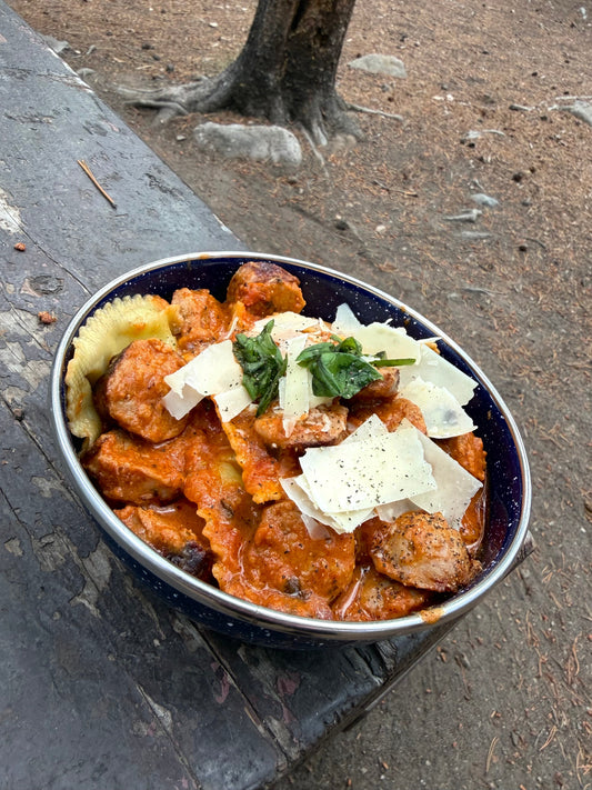 Campfire Tomato Basil Ravioli with Italian Sausage