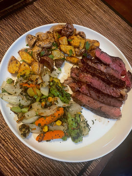 Garlic-Herb Ribeye Steak With Crispy Potatoes & Roasted Veggies