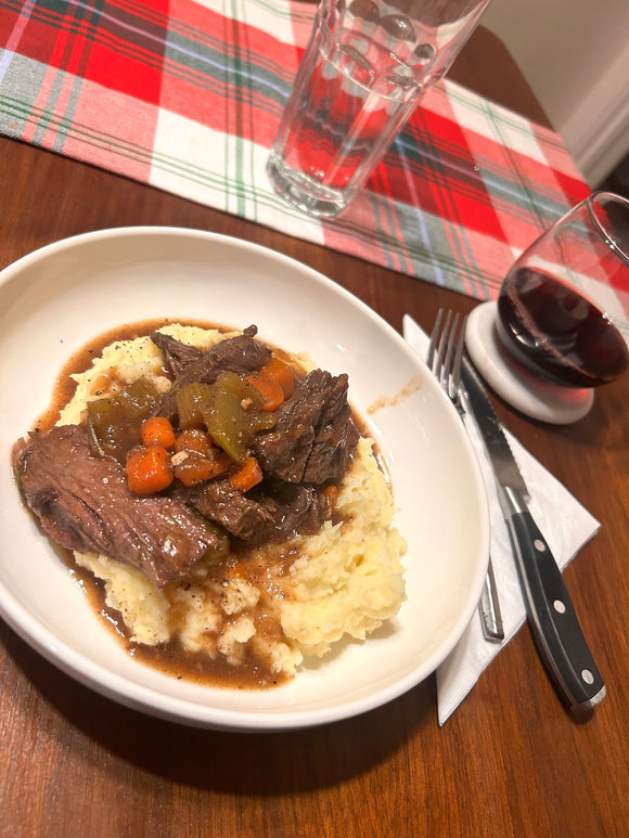 Dutch Oven Chuck Roast Over Mashed Potatoes